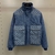 Louis Vuitton Monogram Padded Denim "Blue" Jacket: A padded denim jacket from Louis Vuitton featuring the iconic monogram pattern in blue, perfect for a casual yet elegant look.