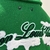 Jaqueta Louis Vuitton Varsity Multi-Patches Mixed Leather "Green": Uma jaqueta verde da Louis Vuitton com vários remendos em couro misto, para um visual esportivo e luxuoso.