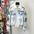 Jaqueta Louis Vuitton Varsity Multi-Patches Mixed Leather "White": Uma jaqueta branca da Louis Vuitton com vários remendos em couro misto, para um estilo esportivo e luxuoso.