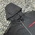 Jaqueta Prada Technical Fabric Hoodie "Black": Uma jaqueta preta com capuz, feita de tecido técnico de alta qualidade, da marca Prada.