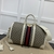 Gucci Savoy Maxi Duffle White and Ebony Handbag: An elegant Gucci handbag with white and ebony details, perfect for luxurious travel and refined style.