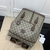 Gucci Medium Interlocking G Backpack in Brown: A medium backpack from Gucci with the distinctive Interlocking G pattern in brown, ideal for a sophisticated, urban look.