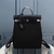 Hermes Backpack in Toile and Black Calf Leather: An elegant backpack from Hermes, in a classic and timeless design, perfect for everyday use with a touch of sophistication.