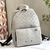 Louis Vuitton Racer Monogram Shadow Leather White Backpack: An elegant backpack from Louis Vuitton, made of white leather with monogram details, ideal for those looking for style and practicality.