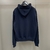 Dior Relaxed-Fit" Hoodie in navy blue: A casual and comfortable piece of clothing from Dior, perfect for relaxed days with style and elegance.