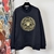 Versace Black Sweatshirt: A stylish and luxurious black Versace sweatshirt, perfect for any casual occasion with a touch of high fashion style.