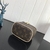 A Louis Vuitton Nano Toiletry Pouch toiletry bag with the brand's Monogram Canvas pattern. This small accessory is perfect for storing personal hygiene items in a compact and elegant way. With its classic and durable design, it is a practical and stylish 