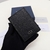 Christian Dior CD Icon Bifold Card Holder Black: An elegant card holder from Dior, featuring the iconic CD monogram pattern in black, ideal for storing your cards in style.