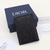 Christian Dior CD Icon Bifold Card Holder Black: An elegant card holder from Dior, featuring the iconic CD monogram pattern in black, ideal for storing your cards in style.