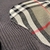 Burberry "Black" Sweater: A black sweater from Burberry for a classic, elegant look on colder days.