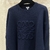 Loewe With Engraved Anagram "Dark Blue" Sweater: A dark blue sweater from Loewe with the emblematic anagram engraved, adding a touch of sophistication and style to the look.