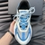 Amiri MA Runner "Light Blue/White" sneakers: Light blue shoes with white details, modern design from the Amiri brand.