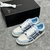 Amiri Skel "Light Blue/Dark Blue/White" sneakers: Shoes in light and dark blue with white details, a modern style from the Amiri brand.