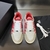 Zapatillas Amiri Skel "Red/White/Beige": Unas zapatillas rojas con detalles en blanco y beige, un estilo moderno de la marca Amiri.