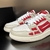 Zapatillas Amiri Skel "Red/White/Beige": Unas zapatillas rojas con detalles en blanco y beige, un estilo moderno de la marca Amiri.