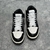 Amiri Skel Top Hi "Black/White" Sneakers: Black high shoes with white details, modern design from the Amiri brand.