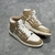 Amiri Skel Top Hi "Brown/White" Sneakers: Brown high shoes with white details, modern design from the Amiri brand.