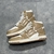 Amiri Skel Top Hi "Brown/White" Sneakers: Brown high shoes with white details, modern design from the Amiri brand.