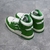 Amiri Skel Top Hi "Green/White" Sneakers: Green high-top shoes with white details, modern design from the Amiri brand.