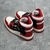 Amiri Skel Top Hi "Red/White/Black" Sneakers: High-top shoes in red with details in white and black, modern design from the Amiri brand.