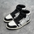 Amiri Skel Top Hi "White/Black" Sneakers: White high shoes with black details, modern design from the Amiri brand.