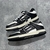 Amiri Skel Top Low "Black/White" Sneakers: Black low shoes with white details, modern design from the Amiri brand.