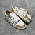 Amiri Skel Top Low "Brown/White" Sneakers: Brown low shoes with white details, modern design from the Amiri brand.