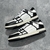 Amiri Skel Top Low "White/Black" Sneakers: White low shoes with black details, modern design from the Amiri brand.