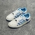 Amiri Skel Top Low "White/Light Blue" Sneakers: White low shoes with light blue details, modern design from the Amiri brand.