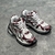 Balenciaga Runner Silver/Wine Sneakers: A pair of Balenciaga sneakers with burgundy details on a silver background, offering a sleek, modern touch to your look.