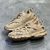 Balenciaga Track "Beige" sneakers: Sports shoe in a beige tone, modern design from the renowned Balenciaga brand.