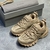 Zapatillas Balenciaga Track "Beige": Zapato deportivo en tono beige, diseño moderno de la reconocida marca Balenciaga.