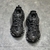 Balenciaga Track "Black" Sneakers: Black sports shoe, modern design from the renowned Balenciaga brand.