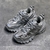 Balenciaga Track "Grey" Sneakers: Gray sports shoe, contemporary style from the renowned Balenciaga brand.