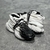 Balmain Unicorn "White/Black" sneakers: White shoes with black details, from Balmain's Unicorn line, elegant and modern.