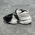 Balmain Unicorn "White/Black" sneakers: White shoes with black details, from Balmain's Unicorn line, elegant and modern.