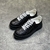 Gucci Chunky GG Embossed All Black Sneakers: Black sports shoes from Gucci with an embossed GG logo, providing style and sophistication in a modern, urban design.