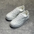 Gucci Chunky GG Embossed All White Sneakers: White sports shoes from Gucci with an embossed GG logo, offering elegance and style in a contemporary and urban design.