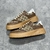 Gucci Chunky GG Monogram Brown/Beige Sneakers: A pair of Gucci Chunky sneakers with GG monogram pattern in brown and beige, reflecting an elegant and modern style.