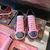 Gucci GG Psychedelic Ace Pink Sneakers: Pink sneakers with a psychedelic GG pattern, reflecting the striking and modern style of the luxury brand Gucci.