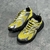 Louis Vuitton Runner Tatic Yellow Sneakers: A pair of vibrant yellow sports sneakers from Louis Vuitton, ideal for running and physical activities, offering style and comfort.