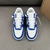 Tênis Louis Vuitton x Nike Air Force 1 Low By Virgil Abloh Blue/White: Um par de tênis com design em azul e branco, resultado da colaboração entre Louis Vuitton e Nike, criado por Virgil Abloh.