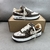 Louis Vuitton x Nike Air Force 1 Low By Virgil Abloh Brown/White Sneakers: An exclusive model of the Air Force 1, in brown and white, the result of a collaboration between Louis Vuitton and Nike, designed by Virgil Abloh.