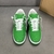 Louis Vuitton x Nike Air Force 1 Low By Virgil Abloh Green Sneakers: A pair of green sneakers, part of the collaboration between Louis Vuitton and Nike, designed by Virgil Abloh.