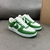 Louis Vuitton x Nike Air Force 1 Low By Virgil Abloh Green/White Sneakers: A pair of green and white sneakers, part of the collaboration between Louis Vuitton and Nike, created by Virgil Abloh.