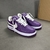 Louis Vuitton x Nike Air Force 1 Low By Virgil Abloh Purple Sneakers: A pair of purple sneakers from the collaboration between Louis Vuitton and Nike, designed by Virgil Abloh.