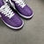 Louis Vuitton x Nike Air Force 1 Low By Virgil Abloh Purple Sneakers: A pair of purple sneakers from the collaboration between Louis Vuitton and Nike, designed by Virgil Abloh.