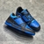 Zapatillas LV Trainer Azul/Negro: Imagen de un par de zapatillas Louis Vuitton en tonos azules y negros, ideales para un estilo urbano y casual.