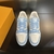 Sky Blue LV Trainer Sneakers: These light blue Louis Vuitton sneakers are an elegant and versatile option to complement any casual look.