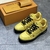 Yellow LV Trainer Sneakers: A pair of Louis Vuitton sneakers in vibrant yellow, perfect for adding a touch of color and style to casual looks.